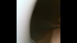 pissing in toilet