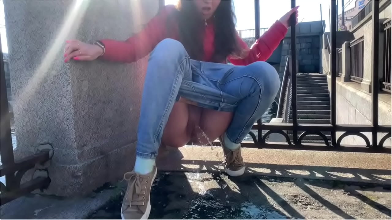 Girl Piss in a Public Flat pic photo