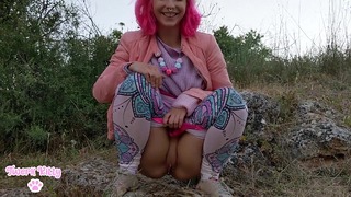 Pink Haired Kitty Getting a Short Pee Outdoors