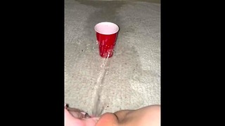 Pis Spray in solo Cup