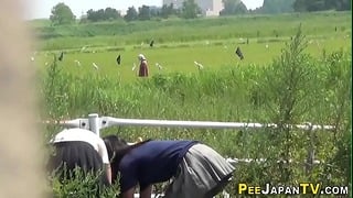 Japanese Teens Squirt Urine Outdoors