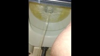 Good morning close up piss and toilet water view