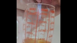 Morning piss in a measuring glass