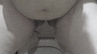 Pissing big butt mature MILF peeing in her panties.