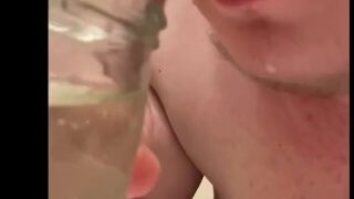 Drinking an overflowing cup of piss