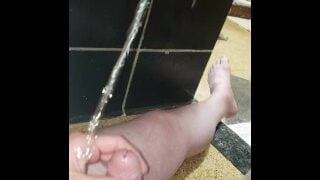 getting golden shower again while I stroke my cock with it