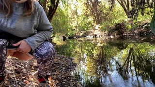 Milf Dressed In Leggings Pissing In The River