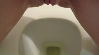 Oily Bald Pussy Dripping Pee In Toilet