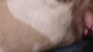 Pissing and making a small puddle on the floor