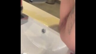 Pissing On Sink
