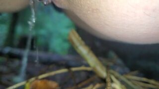 Public piss for Latina milf in the forest just off the trail.. Close up