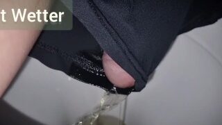 Pulling pants aside to nonchalantly pee them