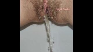 Slow motion pissing girl | Hairy pussy pees Close up