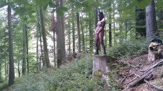 Standing Pissing In A Woods In A Bunny Mask And Fishnet