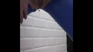 Peeing in the pub toilets wearing my latex jeans