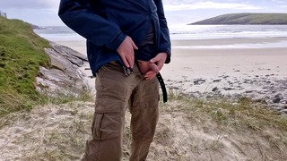 Pissing In Public. Taking A Piss On The Deserted Island Beach.