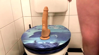 Slave Rides Dildo in the Toilet