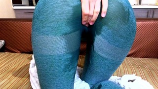 Piss Explosion. Brunette Floods Her Tight Green Leggings With a Wild Golden Shower