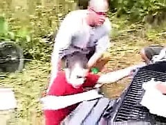 pissing on a guy at a camp out in front of a crowd