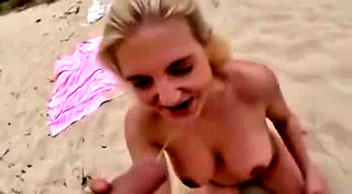 Golden shower pissing on a blonde at the beach