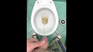 Pissing in public bathroom