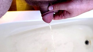 Pissing into the bathtub