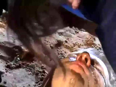 Two girls piss on slave